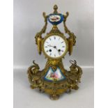 Antique clock, French 8 day mantel clock of gilt metal with inset porcelain plaques twin train