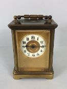 Antique Carriage clock, late 19th Century with once gilded brass case set with glass panels,