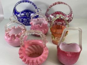Decorative glass, collection of 19th and 20th century glass baskets, to include pink and white swirl