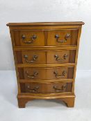 Serpentine fronted small chest of four drawers