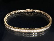 9ct Gold Tennis style bracelet marked 375 CZ and approx 19cm in length total weight 9.9g