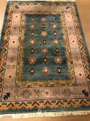 Modern Rug of oriental design, geometric patterns on a two colour back ground approximately 230 x