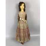 Antique doll, early 19th Century wood and cloth bodied doll with painted gesso face, silk clothes