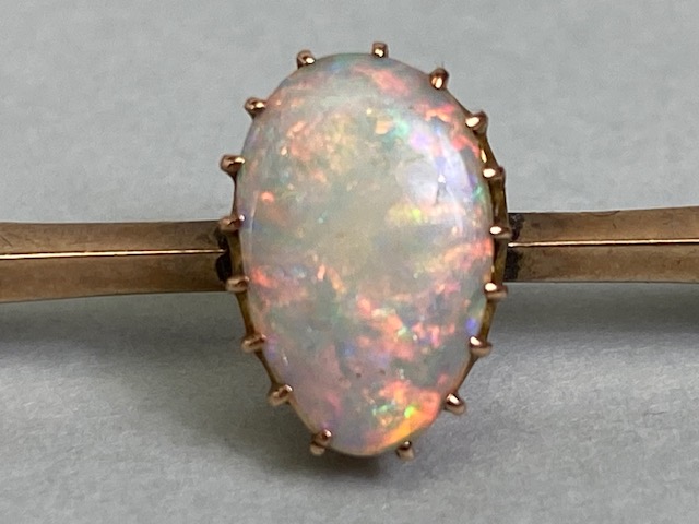 Unmarked antique gold bar brooch set with a pear shaped opal approximately 5 x 10mm, total weight - Image 2 of 7