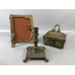 Vintage Brass ware: an Art Nouveau picture frame, beetle nut box, and a candle holder with lion