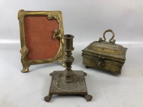 Vintage Brass ware: an Art Nouveau picture frame, beetle nut box, and a candle holder with lion