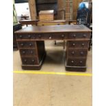 Twin pedestal leather topped writing desk with total nine drawers with turned handles