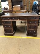 Twin pedestal leather topped writing desk with total nine drawers with turned handles