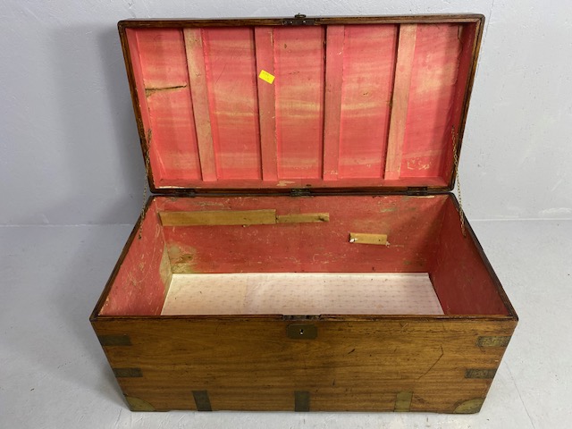 Large Campaign travelling trunk with brass bindings and corners and hinged carry handles to sides - Image 8 of 8