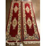 Chinese wool rugs, Two sculpted hall runners with typical designs of flowers against red back ground