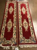 Chinese wool rugs, Two sculpted hall runners with typical designs of flowers against red back ground