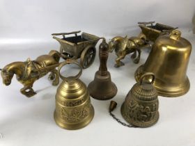 Vintage Brass ware, to include a pair of heavy horses pulling carts and Four bells, (the larger with