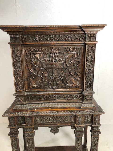 Heavily carved square cupboard on stand, carved with inscription "Venetia", cupboard with fall - Image 2 of 12