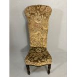 Antique Furniture, Victorian high back prayer chair upholstered in floral brocade, on turned legs