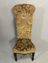 Antique Furniture, Victorian high back prayer chair upholstered in floral brocade, on turned legs