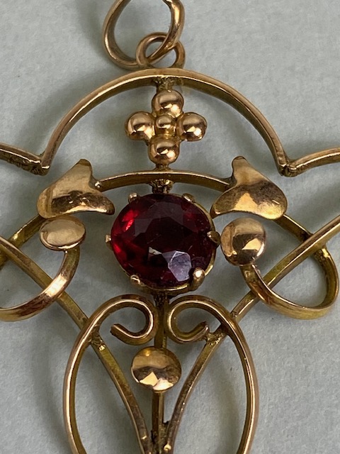 Antique jewellery, Art Nouveau unmarked rose gold metal pendant set with two garnets, - Image 4 of 5