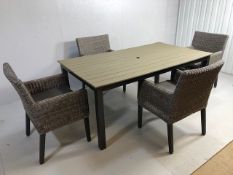 Garden or Patio Table of plank style and four chairs of Rattan by Kettler steel framed, table