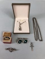 Collection of silver jewellery to include a pair of green stone set cuff links , a cat pendant and