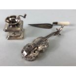 Miniature silver items to include a continental silver Violin and Coffee grinder and an English