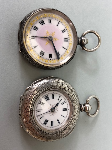 Silver hall marked ladies fob watches one half hunter style with white dial and Roman numerals,