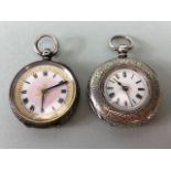 Silver hall marked ladies fob watches one half hunter style with white dial and Roman numerals,