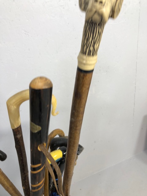 Collection of vintage walking sticks and hiking poles in a Victorian style brass stand 10 items - Image 7 of 12