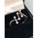 18ct White Gold contemporary/ studio design ring stamped 'PT' possibly continental set with six