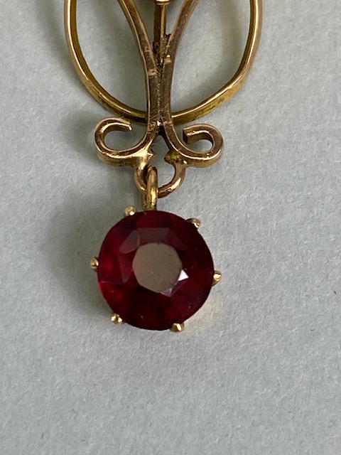 Antique jewellery, Art Nouveau unmarked rose gold metal pendant set with two garnets, - Image 3 of 5