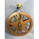 Decorators / Shop display interest, two oversized wheel cogs of composite board with a planetarium