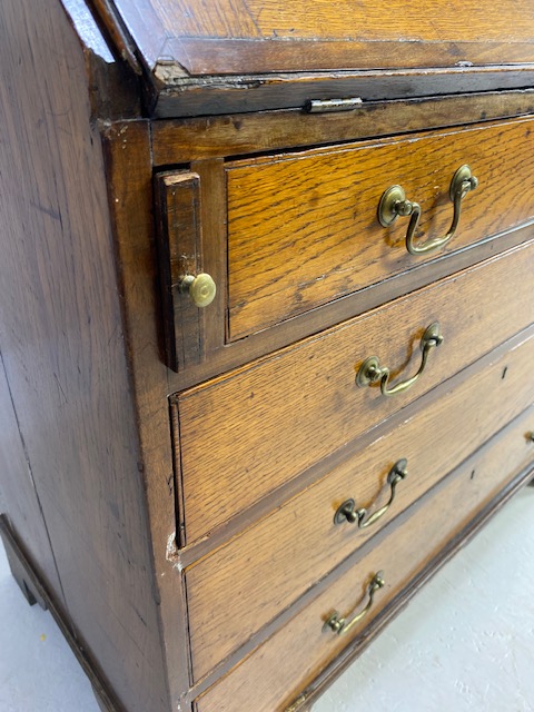 Oak Bureau with four drawers, fall front revealing pigeon holes and ornate key to lock approx 97 x - Image 6 of 14