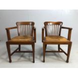 pair of mid-century leather seated elbow chairs A/F