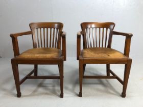 pair of mid-century leather seated elbow chairs A/F