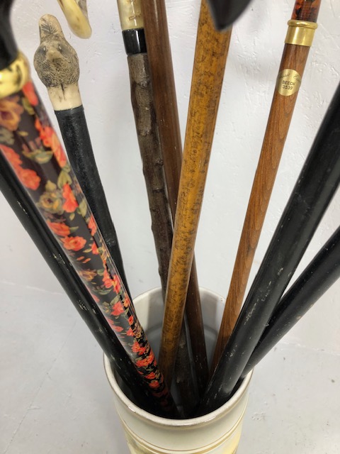 Collection of walking sticks in a ceramic stick stand , various designs, faux amber, faux bone, horn - Image 10 of 12