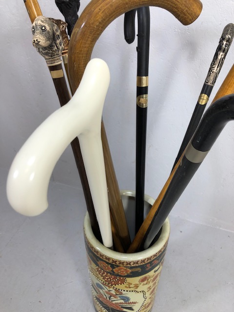 Collection of vintage walking sticks , animal head tops, horn,stone set, white metal, in a - Image 8 of 12
