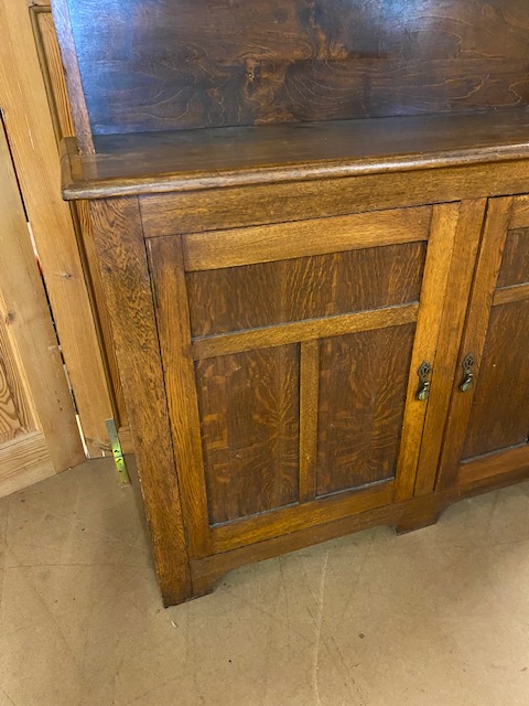 Arts and Crafts oak dresser with shelves above and two cupboards under by maker Curtiss & Sons, - Image 2 of 6