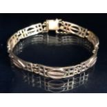 9ct Gold Bracelet with open work rectangular panels approx 19cm in length and 15.9g