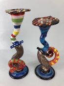 Ross Emerson Art ceramics, being Two twisty candle sticks in multi colour ways approximately 24