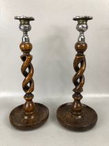 Wooden twisted stem / open barley twist candle sticks with silver coloured metal mounts each