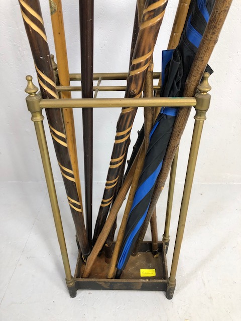 Collection of vintage walking sticks and hiking poles in a Victorian style brass stand 10 items - Image 2 of 12