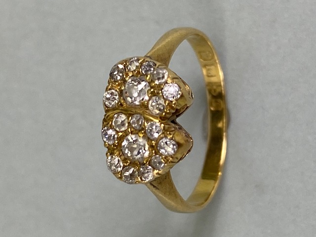 18ct yellow gold ring of 2 joined heart shaped cluster settings set with diamonds approximately 2.7g