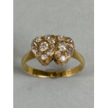 18ct yellow gold ring of 2 joined heart shaped cluster settings set with diamonds approximately 2.7g