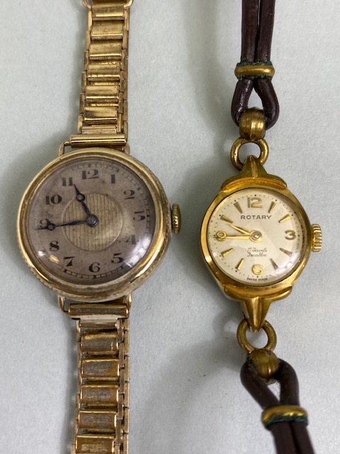 9ct gold cased ladies dress watch on a RG bracelet, winds and runs, along with a vintage Rotary