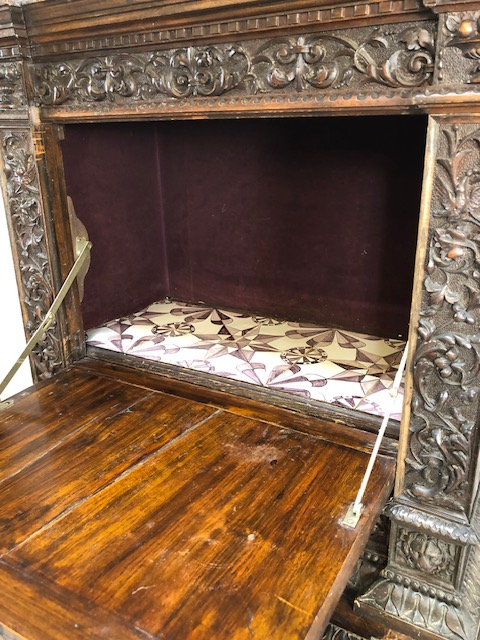 Heavily carved square cupboard on stand, carved with inscription "Venetia", cupboard with fall - Image 4 of 12