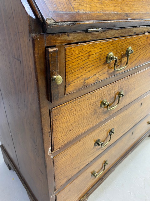 Oak Bureau with four drawers, fall front revealing pigeon holes and ornate key to lock approx 97 x - Image 5 of 14