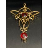 Antique jewellery, Art Nouveau unmarked rose gold metal pendant set with two garnets,