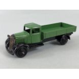 Dinky Toys, 25A Bedford flat bed lorry in green with black hub caps and grill