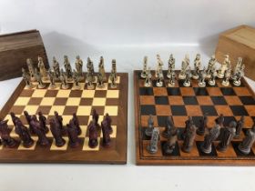Vintage Chess sets, two composite material Imperial roman chess sets in a wooden cases and Two chess