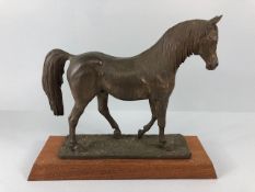 Vintage Bronze finish cold cast metal statue of a horse on a wooden plinth, approximately 26 cm