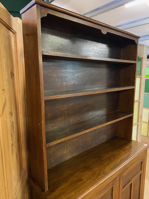 Arts and Crafts oak dresser with shelves above and two cupboards under by maker Curtiss & Sons, - Image 4 of 8