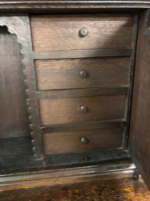 Dresser: late 19th century dark oak continental buffet cupboard, having extensive pictorial carved - Image 8 of 13